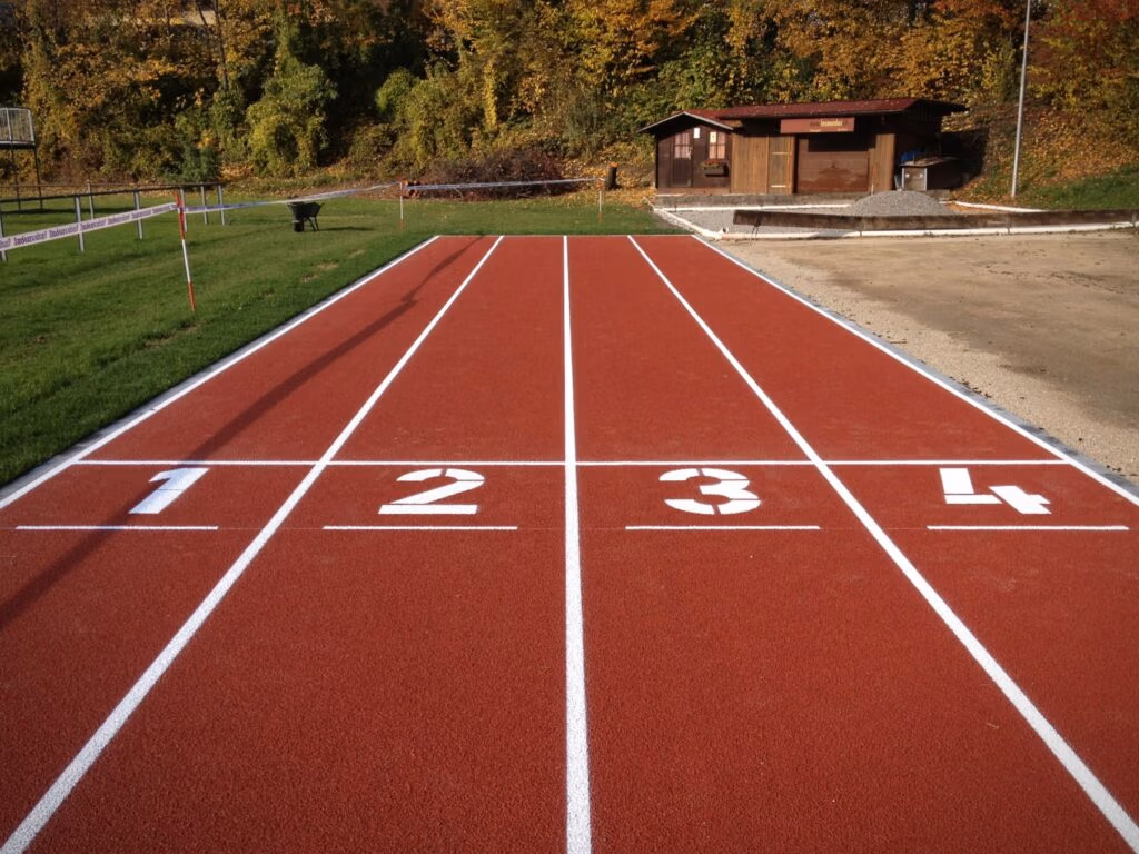 St-Prex, création d'une piste d'athlétisme en EPDM.