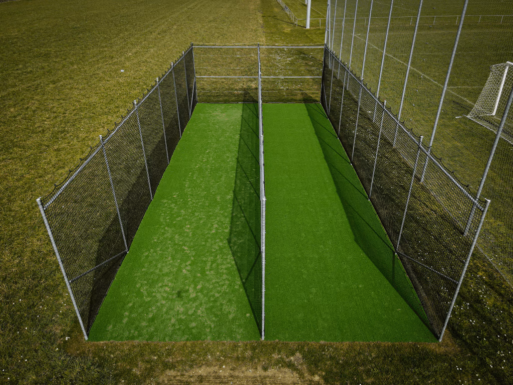 Création d'équipement sportif sur un terrain de cricket.
